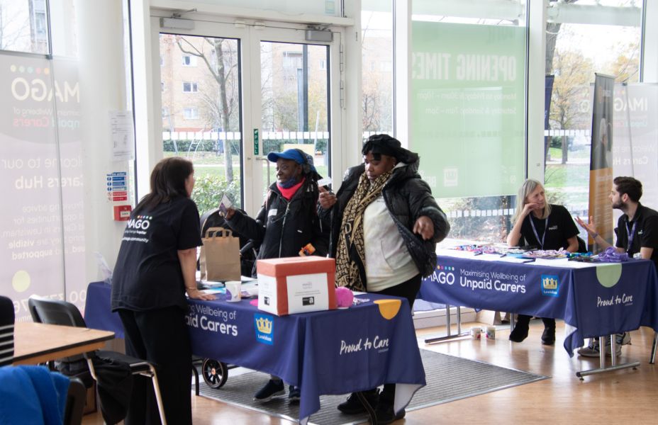 carers talking to an Imago member of staff